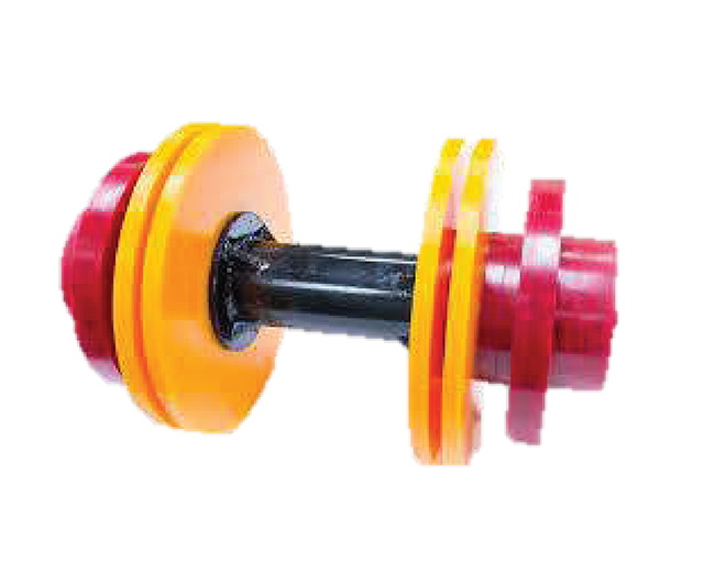 Componente industrial con un eje central de color negro, discos circulares de color rojo y naranja y una pieza blanca en el extremo.